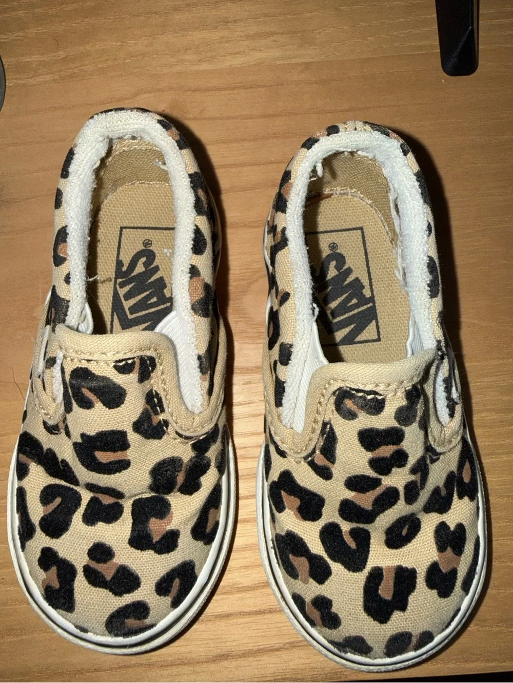 Vans Kids Slip-On Sneakers in Tan and Black Leopard Print